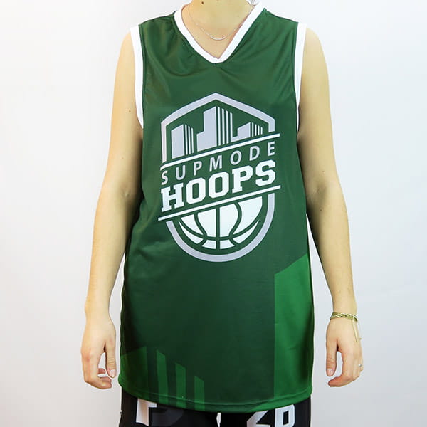 torso of a woman wearing a green basketball jersey